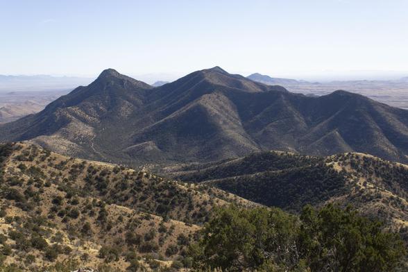 Black Diamond Mountain (L) and Peak 7155 just in view to the south from Sala Benchmark