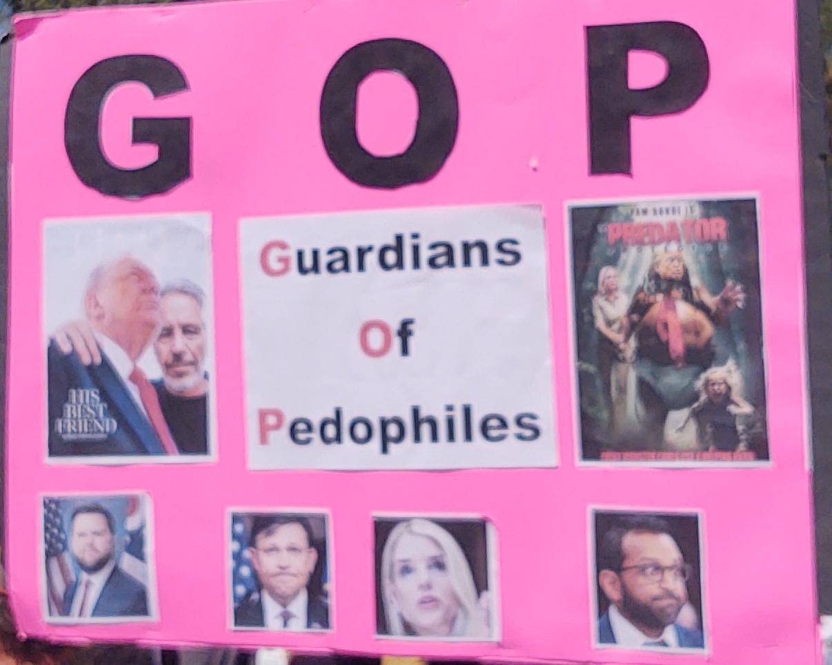 Sign that says, "GOP - Guardians of Pedofiles" with pictures of various people who have been protecting Trump and hiding the Epstein files
