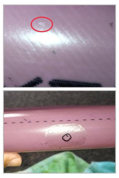 Close up of a TPU bicycle inner tube, with the tiny puncture from a bindii circled. Below is the patch applied to the bindii-caused flat in the same tube yesterday.
