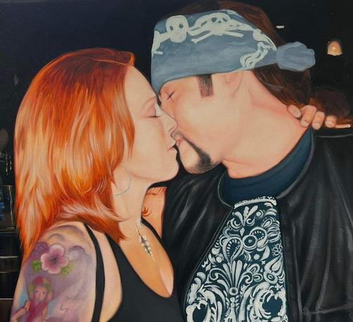 a painting of a couple wearing motorcycle enthusiast garb, embracing and kissing, seen from the side, they are in a bar setting 