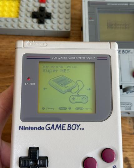 Pixel Super Nintendo shown in Pocket Collection on an original DMG.