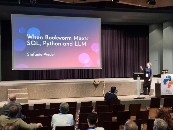 stefanie wedel from pyladies zurich giving her lightning talk "when bookworm meets sql, python and llm"