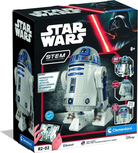 Photo de la boîte du jouet R2-D2 à monter soi-mème. Elle est de couleur sombre, comporte Darth Vader dans le coin supérieur droit, et le logo Star Wars dans le coin opposé.