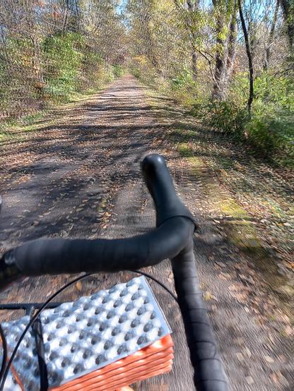 Bicycle handlebars pov of tail riding