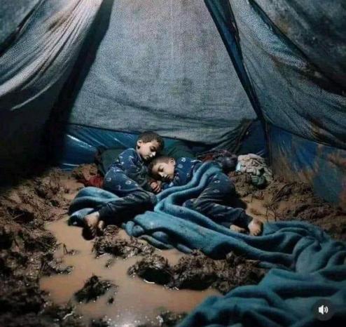 A plea to all kind-hearted souls:  
I just want to protect my children from the freezing cold inside these tents.  
Please, help us. 🙏💔🇵🇸