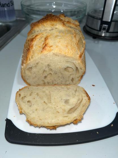 Whole loaf of bread and sliced view