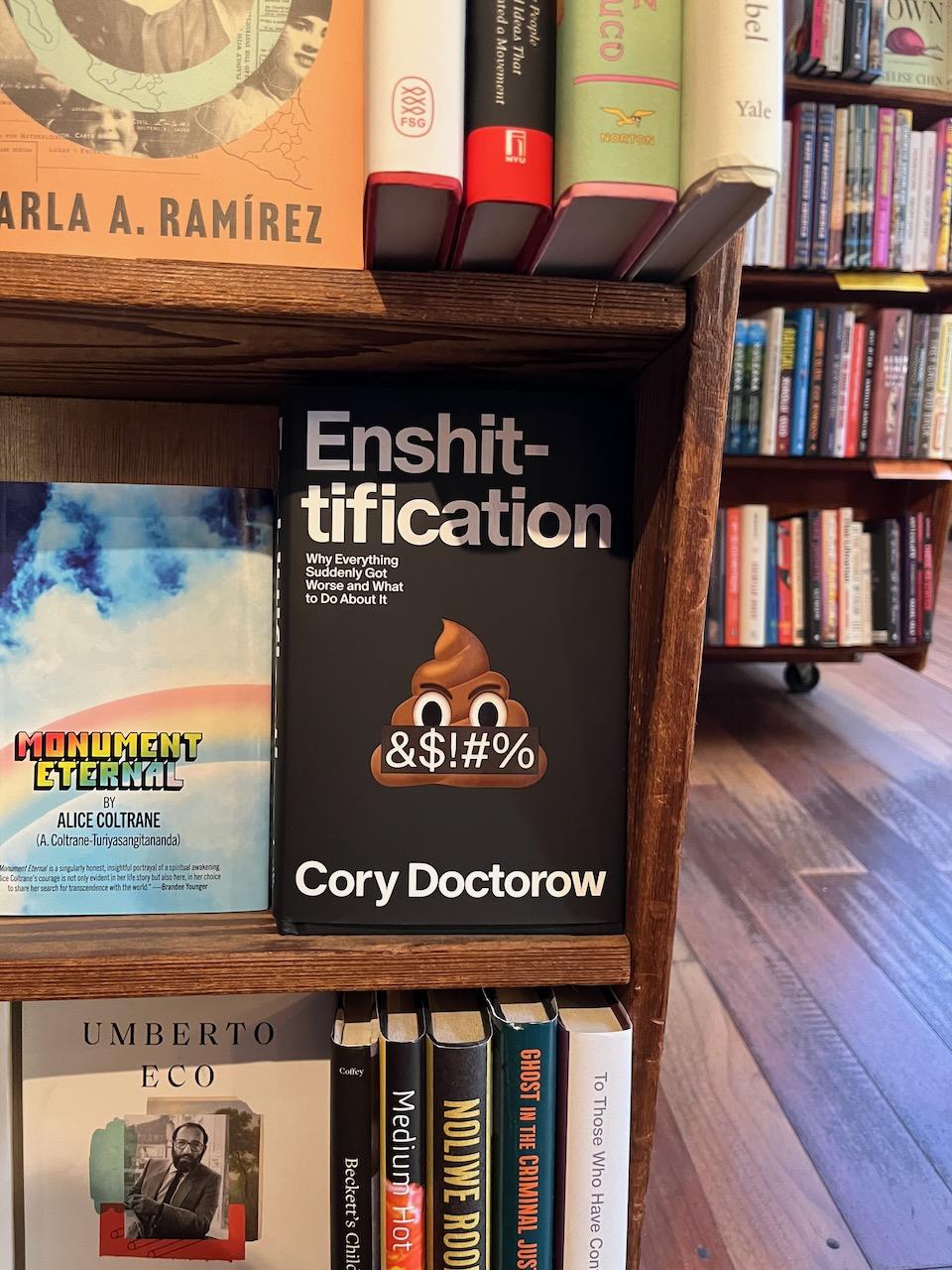Doctorow’s book, “Enshittification,” on a shelf in a book store.