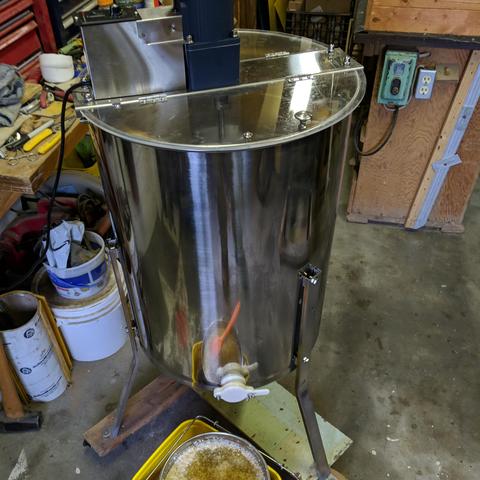 The electric honey extractor.