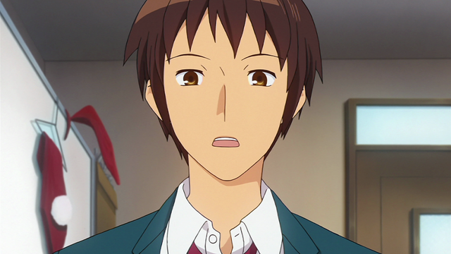 A boy (Kyon) with a slightly surprised expression.