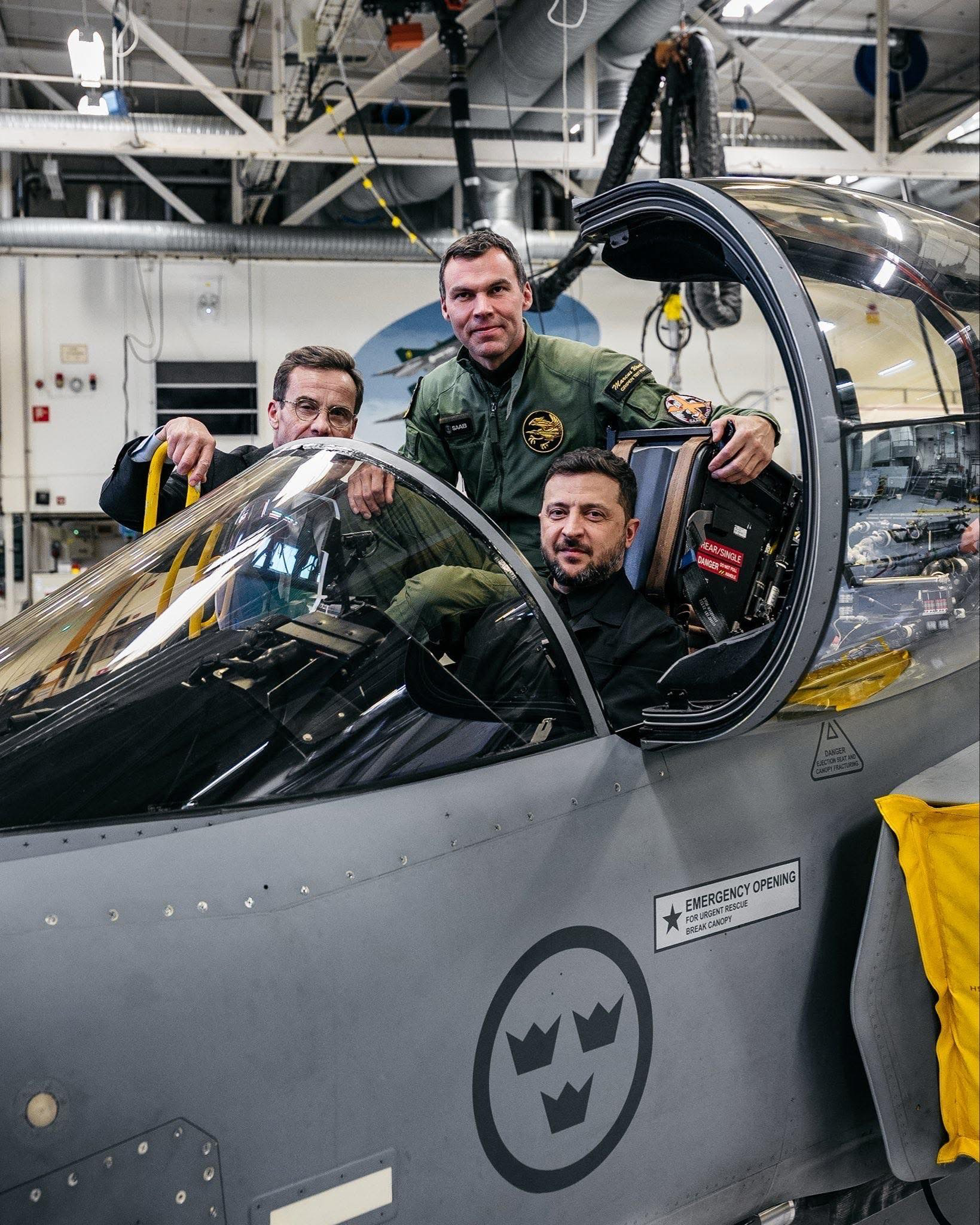 Photo of Ukrainian President Zelensky sitting in the cockpit of a Swedish SAAB JAS Gripen fighter jet.