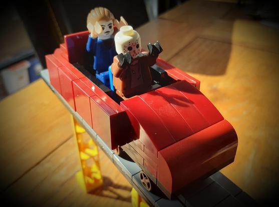 Jason and Michael riding on a rollercoaster