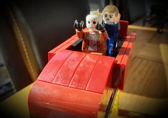 Jason and Michael riding on a rollercoaster