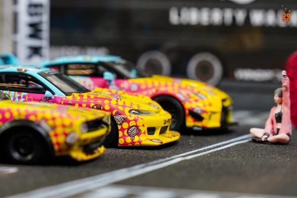 2 Nissan Skyline cars: Kenmeri, 35GT-RR and Silvia S15 in LBWK Kuma livery in 1:64 scale with 1:64 figure on AREA 164