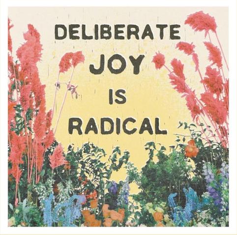Black text that reads "Deliberate joy is radical." Surrounding the text are flowers and bushes in various bright colours, and there's a glow background.