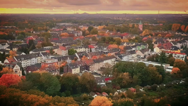 Ein Stadtviertel von oben mit Einblendung Speckschweiz