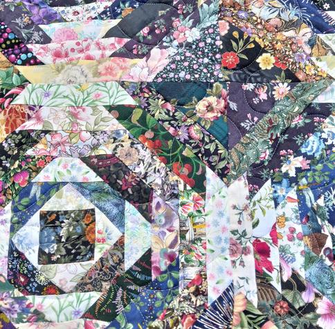 a close-up of the face of the quilt