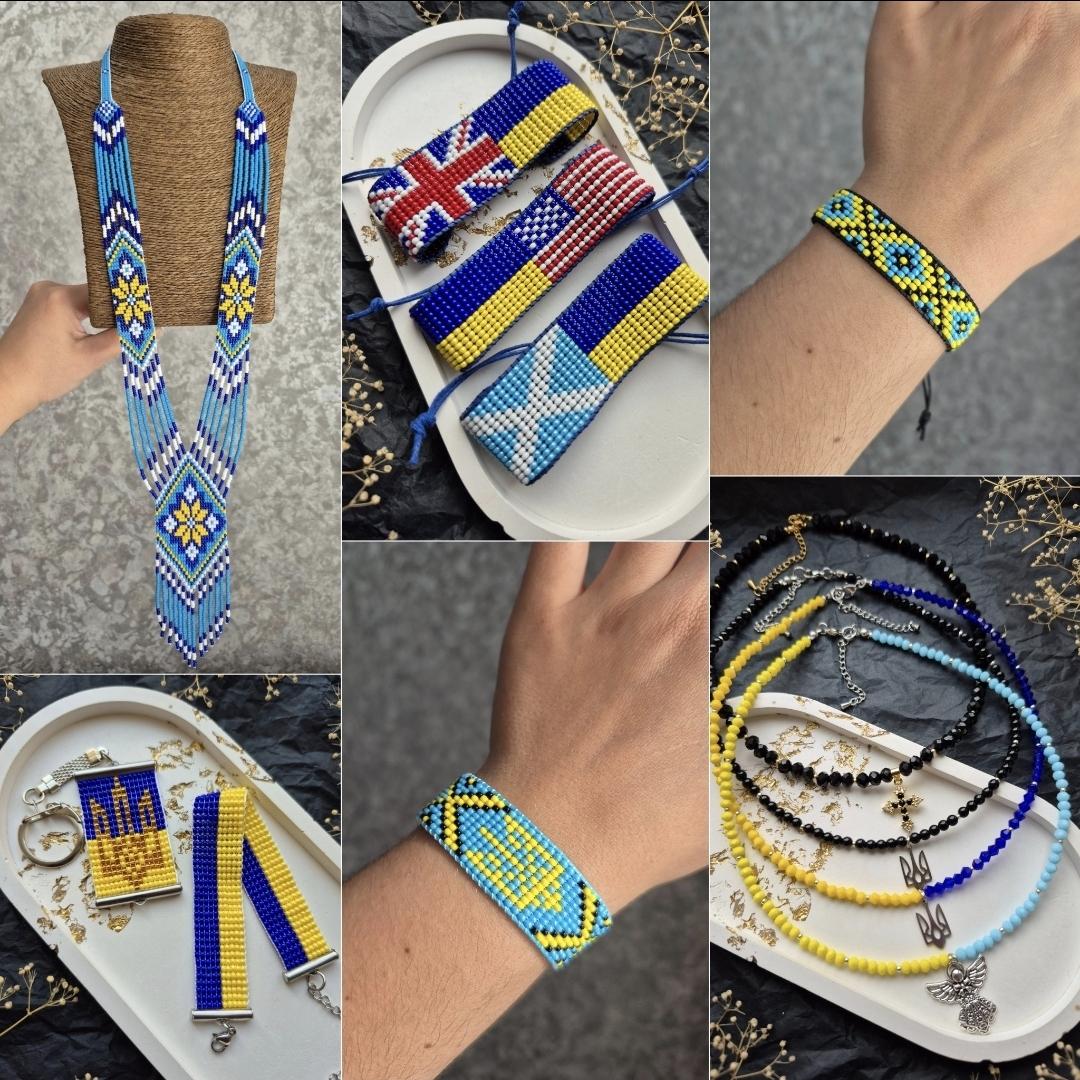 A collage of patriotic beaded jewelry. The photo shows a long necklace (blue beads with a yellow and white geometric pattern), beaded bracelets with Ukrainian and British flags, and rectangular beaded key chains. The bottom right corner shows thin necklaces of yellow, blue, and black beads and stones with metal pendants, including a Trident.