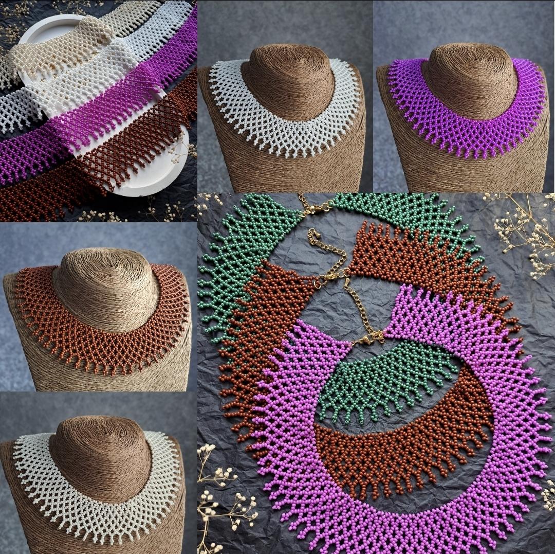 A collage of images of delicate collar necklaces woven from tiny beads that mimic lace. The jewelry is presented in various colors - milky white, bright purple, copper brown and emerald green. The upper part shows folded strips of beads. The lower part shows several finished products laid out on a dark background, emphasizing their sharp jagged edges and complex weaving technique,.