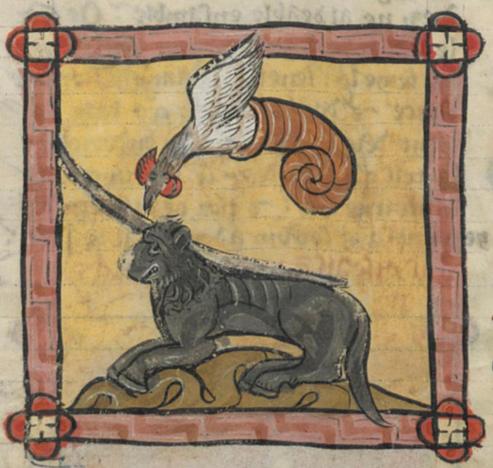 A smiling bulky black quadruped with very long pointed horns, one facing forward and one backward, lying on a brown hill with a flying creature (it has the white head and body of a rooster joined to the curled brown end of a serpent) pecking at the top of its head. The black creature seems to have a ruff and has a blunt snout. Image from Bibliothèque de l'Arsenal, Ms-3516 (L'Image du monde / Bestiaire of Pierre de Beauvais), folio 206v.