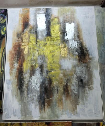 a painting, it is abstract tones of black, rust, and gold and silver on a silvery-grey background 