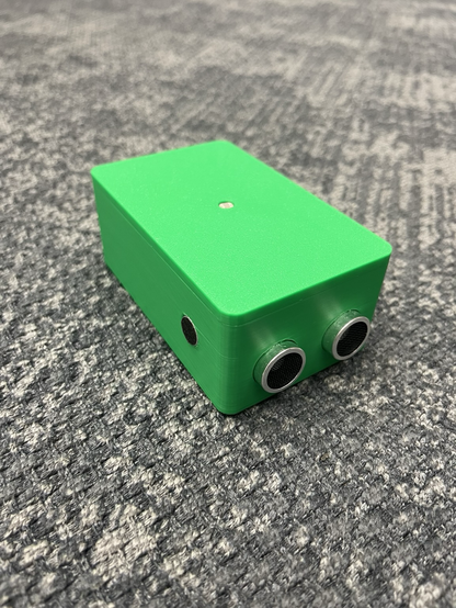 A mobile battery powered sensor device for wireless communication of movement for sonification. It’s green!