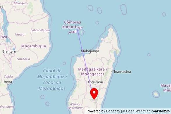 A map showing the great circle route from Comoni in Comoros to a map pin at Jesosy Mamonjy, N 7, Firaisantsoa, 303 Anara I, Madagascar