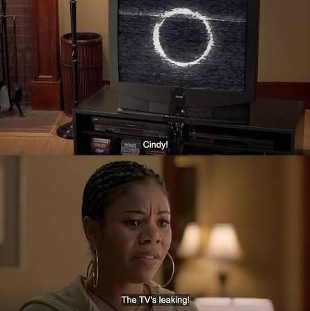 Two pane: top: TV with a white ring and static. &10;Bottom: Regina Hall's character: "The TVs leaking"