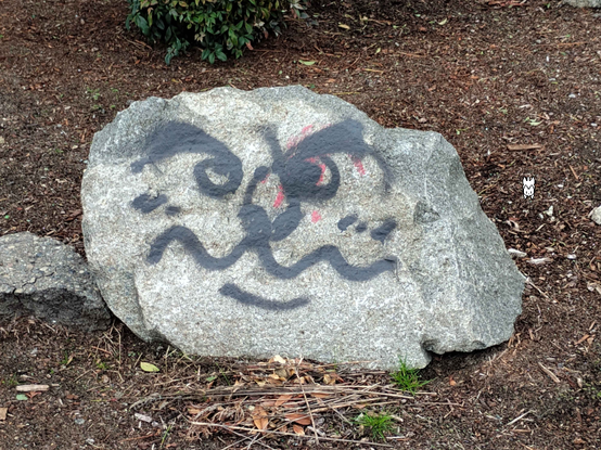 Image of a rock with a Thwomp face from the Super Mario universe.