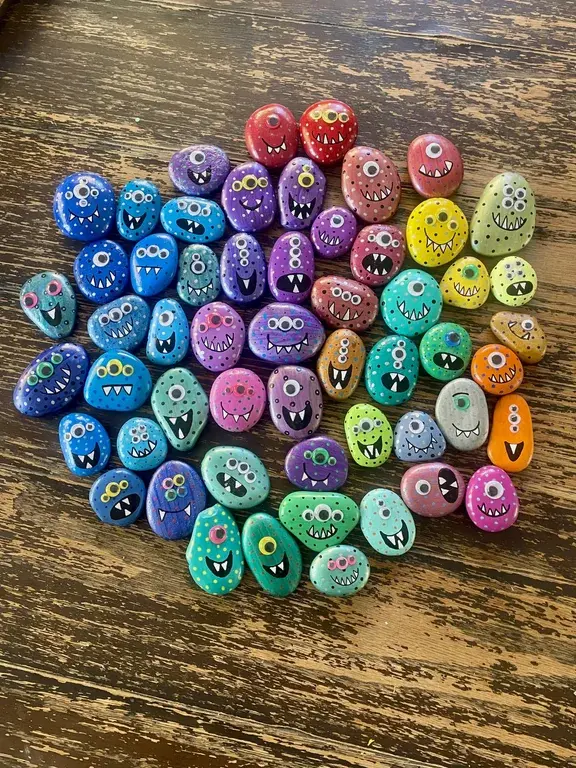 rocks painted to look like little cute monsters
source:
https://old.reddit.com/r/pics/comments/1oki2lq/oc_i_painted_some_monster_rocks_to_hand_out_for/
