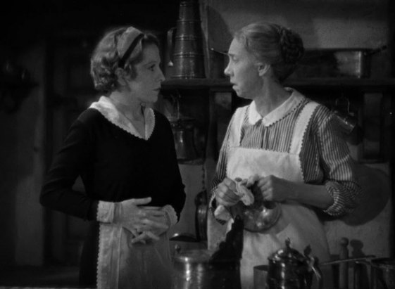 an image of the two cooks / maids having a conversation in the kitchen