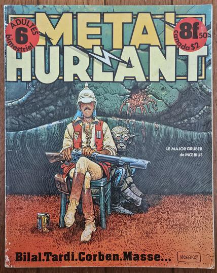 Métal Hurlant magazine issue number 6, March 1976, featuring art by Mœbius "Le Major Gruber" displaying the armed major and a monstrous companion sitting next to a super sized monster freshly shot down. Other artists are mentioned: Bilal, Tardi, Corben, Masse. 