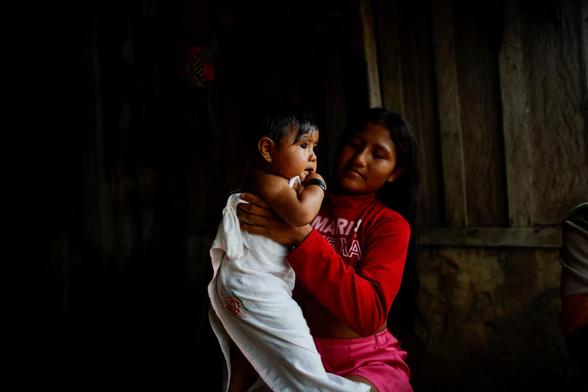A mother with her baby in the Amazon.