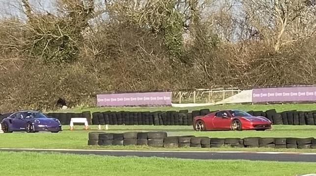 On the home straight, timf in a 458 with the Porsche GT3 RS he'd been driving only minutes earlier chasing.