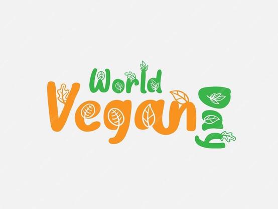 Phrase « world vegan day » dessinée en orange et vert sur fond blanc. Il
Y a des feuilles de dessinées sur chaque lettre.