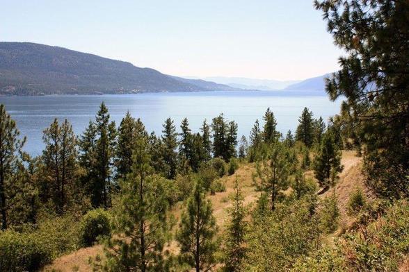 A long view from the hilltops over the beautiful Okanagan Lake, looking south to where the Okanagan River leads down the valley all the way to the Columbia River.