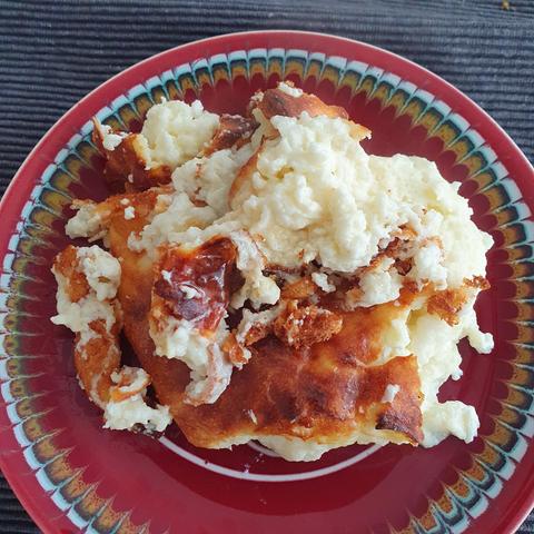 Messy cheesecake (it's falling apart since it's pretty much just yge filling) on a small plate. 