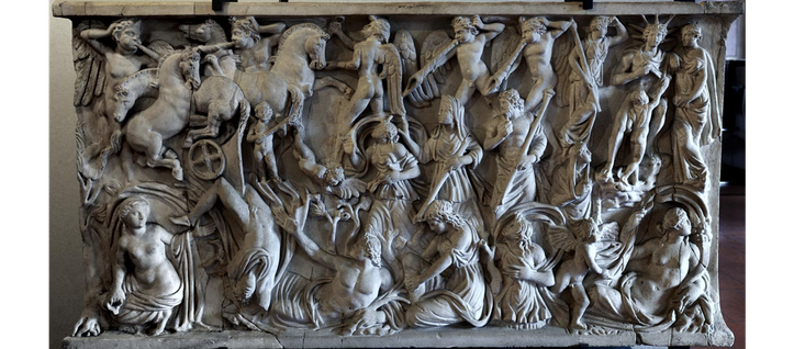 Panel of a sarcophagus with a marble relief of Helios grieving for his son Phaethon. He is comforted by a child and a female figure.