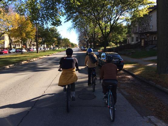 Bike riders on the street.