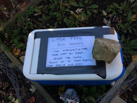 A cooler full of food for those in need.