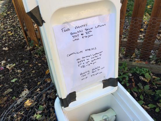 A cooler full of food for those in need.