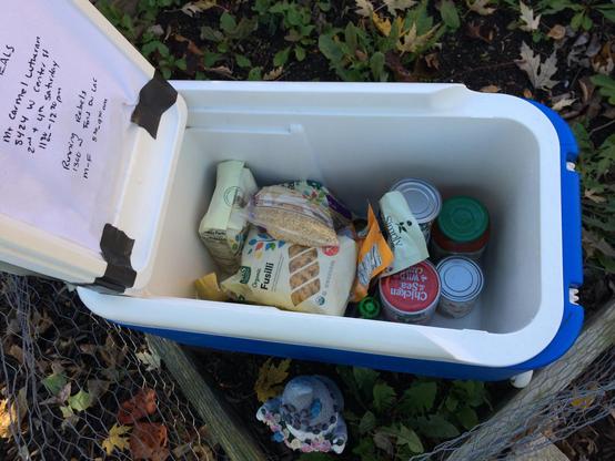 A cooler full of food for those in need.