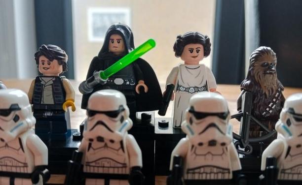 A closer shot of Luke and Leia as King and Queen, with Han Solo and Chewbacca standing either side