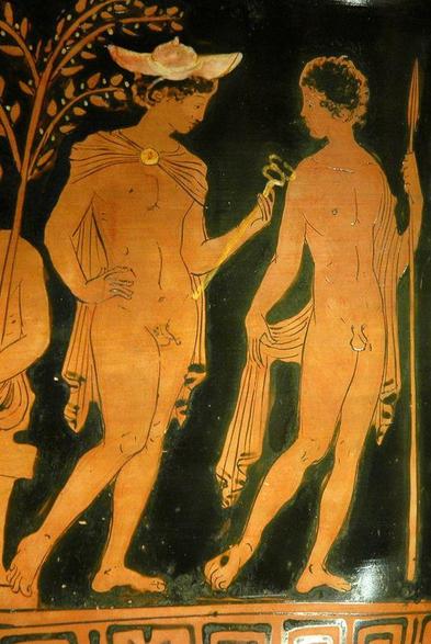 Detail of a red-figure vase painting: Hermes with a young athlete or soldier. Hermes wears his petasos hat on his short, curly hair, a chlamys cloak fastened over his breast, and is nude otherwise He holds his iconic kerykeion staff that identifies him as the god Hermes. The young man beside him is also nude, a spear or javelin in his left hand and a himation draped over his left arm.