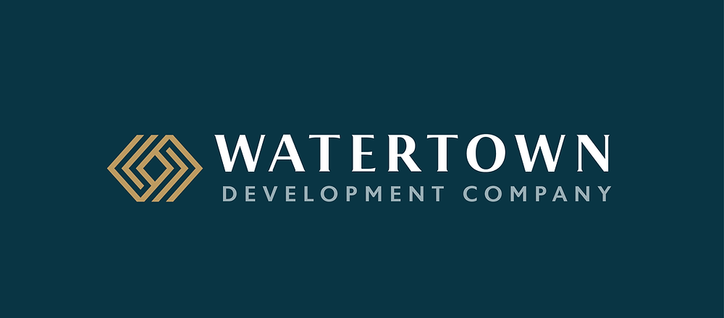 Logo on a dark teal background reads "Watertown Development Company" with a gold geometric design. Sleek and professional.