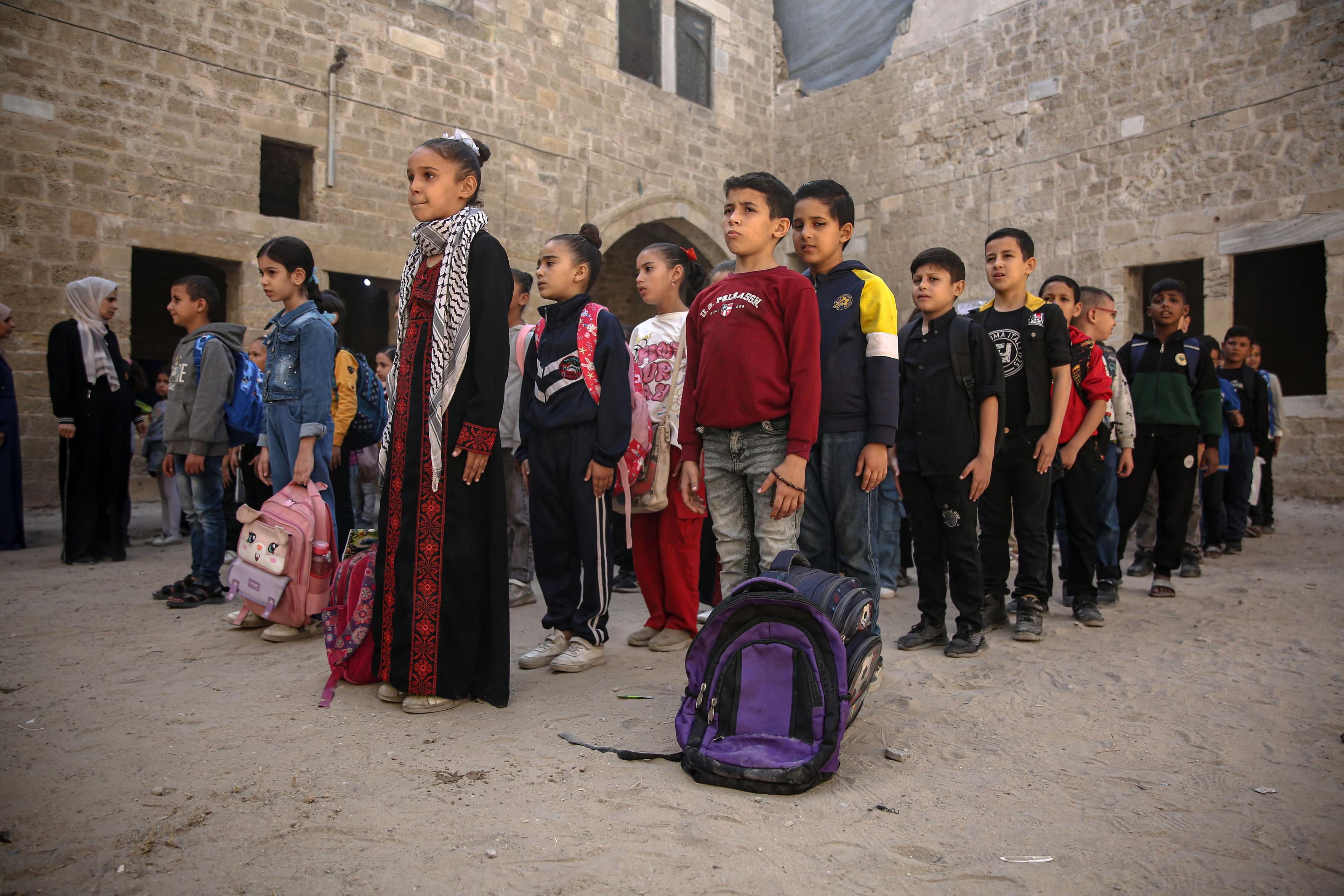 Palestinian students attend classes at al-Kamaliya school.