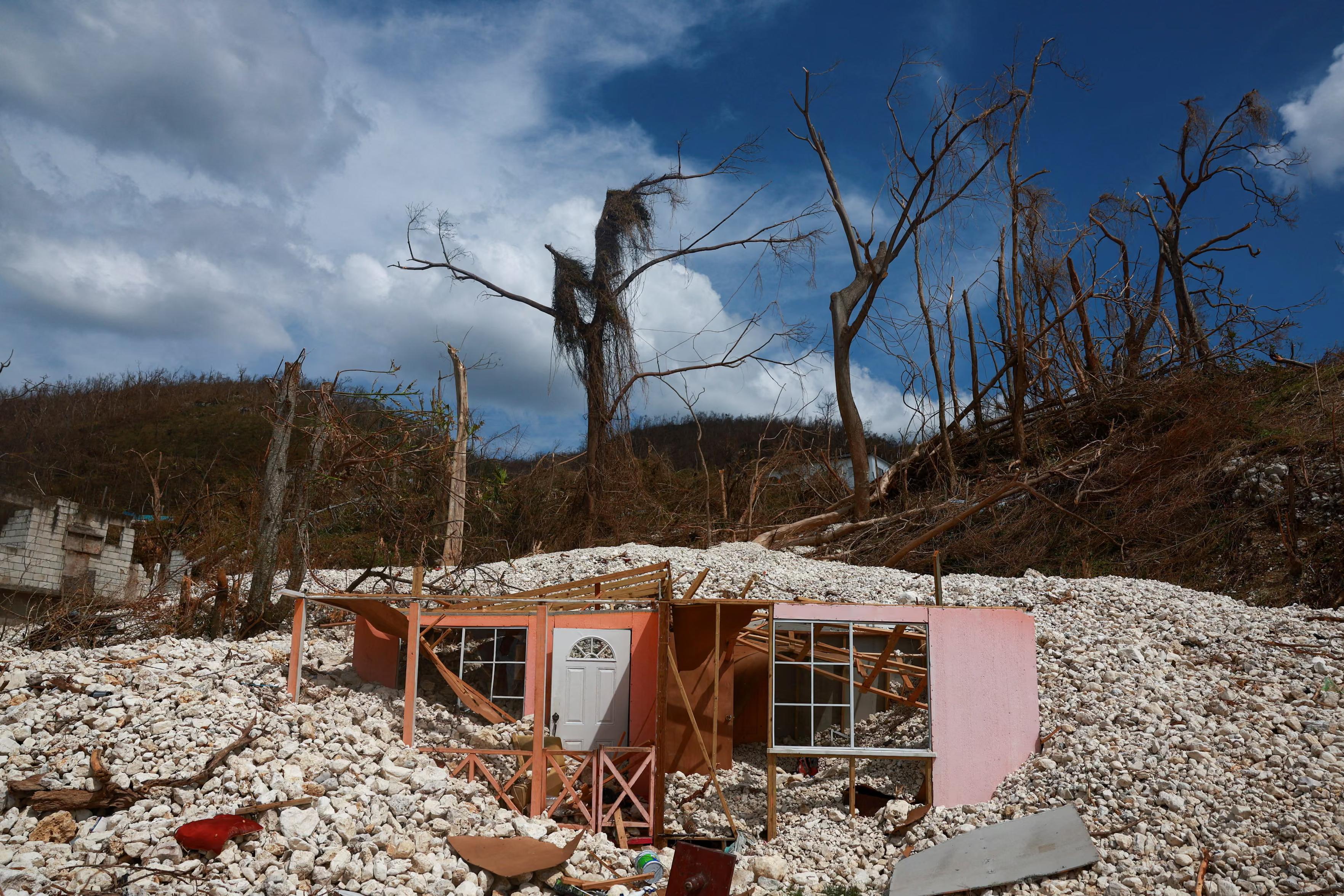 The remains of a destroyed house stand in the aftermath of Hurricane Melissa in Mearsville.