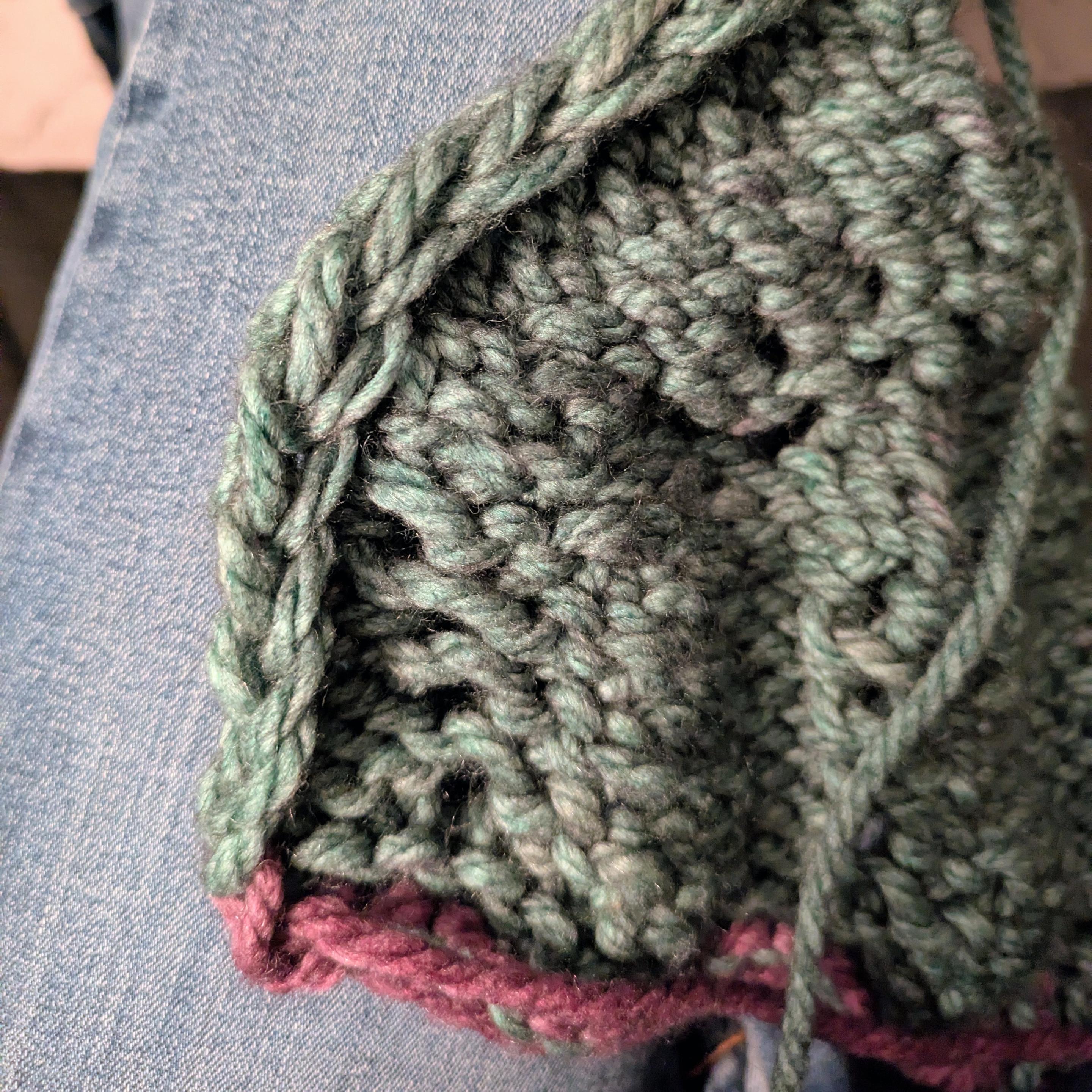 Picture of the kind of ugly scarf I'm making to use up the kind of ugly yarn I bought for absolutely no good reason.