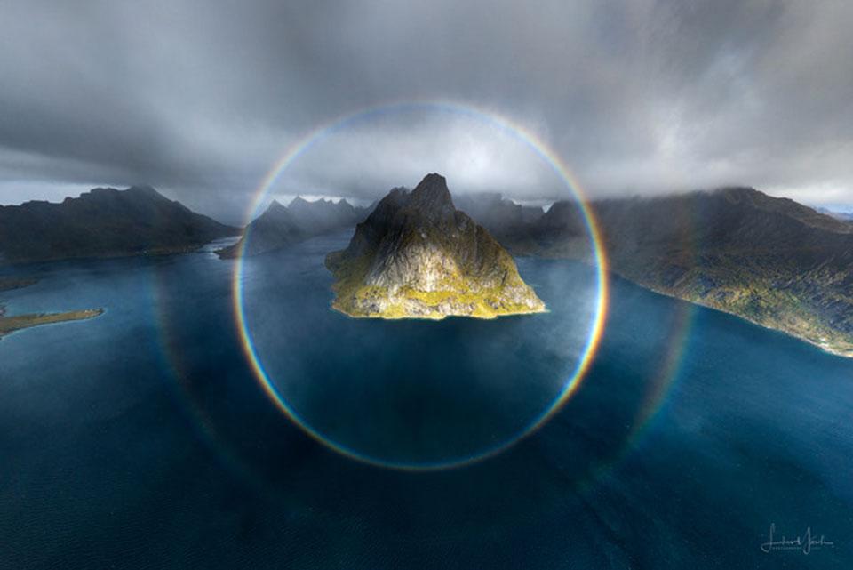 Pictured here, a full-circle rainbow was captured over the Lofoten Islands of Norway in September by a drone passing through a rain shower. An observer-dependent phenomenon primarily caused by the internal reflection of sunlight by raindrops, the rainbow has a full diameter of 84 degrees. The Sun is in the exact opposite direction from the rainbow's center. As a bonus, a second rainbow that was more faint and color-reversed was visible outside the first.
Image Credit & Copyright: Lukas Moesch