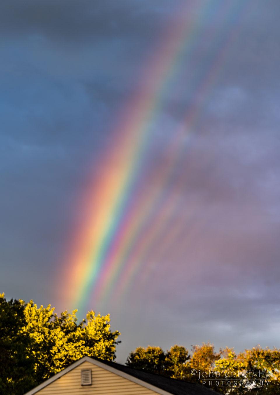 Over the course of a next half hour, to the delight of the photographer and his daughter, vibrant supernumerary rainbows faded in and out, with at least five captured in this featured single shot. Supernumerary rainbows only form when falling water droplets are all nearly the same size and typically less than a millimeter across. Then, sunlight will not only reflect from inside the raindrops, but interfere, a wave phenomenon similar to ripples on a pond when a stone is thrown in. In fact, supernumerary rainbows can only be explained with waves, and their noted existence in the early 1800s was considered early evidence of light's wave nature.