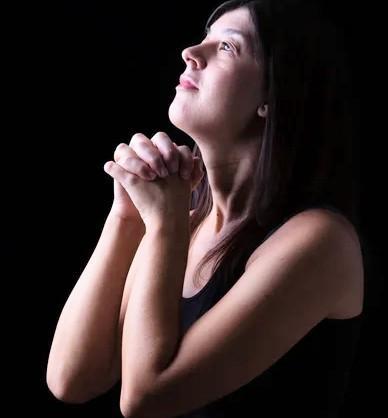 A woman praying 